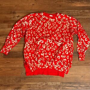 Red leopards sweater